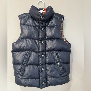 Navy blue puffer boys outdoor vest.  Size Small 6-7. Very warm and stylish.